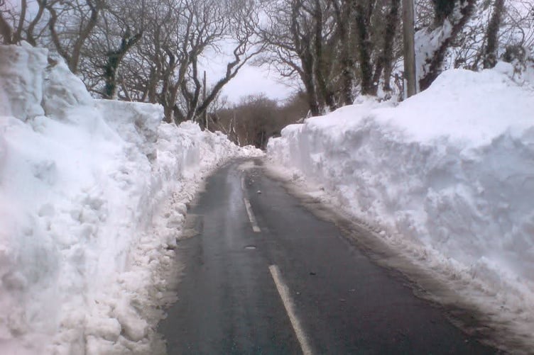 Walls of snow banked each side of the island's roads following the 2013 snowstorm