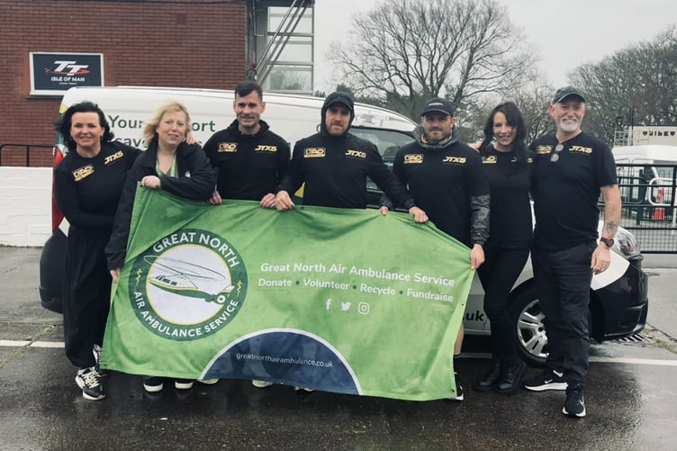 Josh Thomas, Danny Roberts and Shaun McEntee, along with Jordan's mum Savina, dad Mark and sister Jade and a Great North Air Ambulance Service representative at the Grandstand during the JTX5 challenge