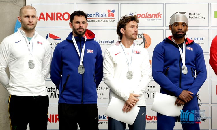 Isle of Man athlete Daniel Stewart-Clague (left) with his Great Britain team-mates after winning a silver medal in the 4x200 relay at last week's European Masters Athletics Indoor Championships in Poland