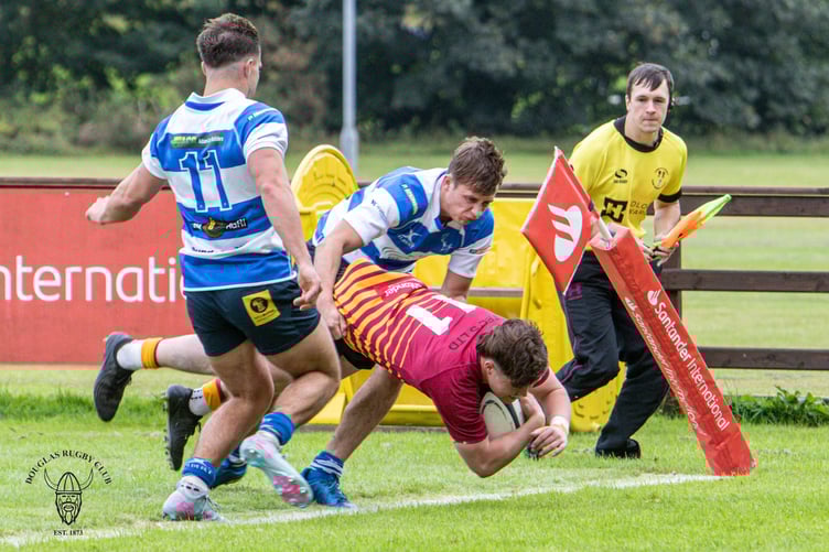 Ollie Corkish scores against North Ribblesdale on the opening day of the season (Photo: Richard Ebbutt)