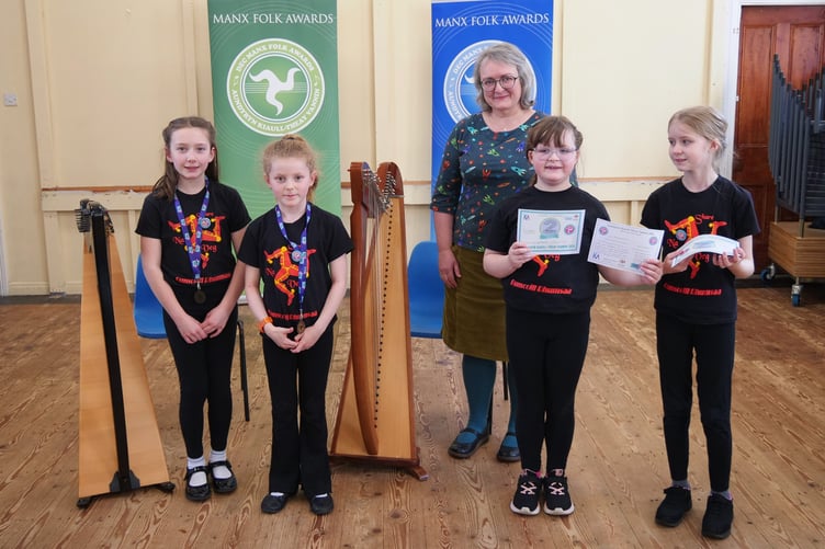 Pupils from Bunscoill Rhumsaa, pictured with Culture Vannins Dr Breesha Maddrell collecting their