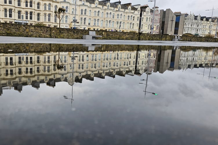 Lisa Young sent in this photo of the reflections in a puddle on Douglas Promenade