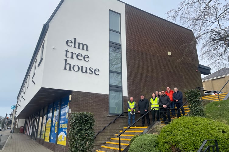 Billy Flowers and Richard Brinkler (Cedar Developments Ltd), alongside Onchan Commissioners Anthony Allen, Robin Turton, Oliver Lockwood, John Bowness, Andrew Gibson, and David Quirk outside Elm Tree House