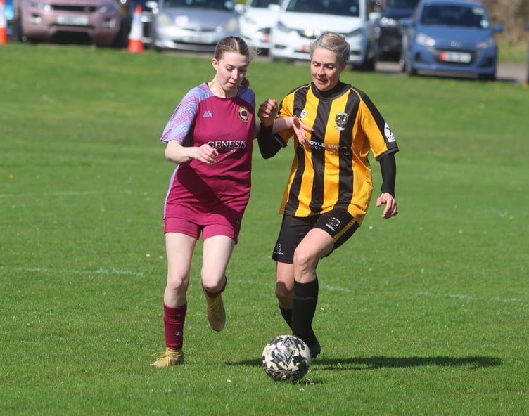 Union Mills' Kiera Leece (left) and Rushen Utd's Lee-Anne Stuber compete for possession during Sunday's Canada Life Women's League clash at Garey Mooar (Photo: Paul Hatton)