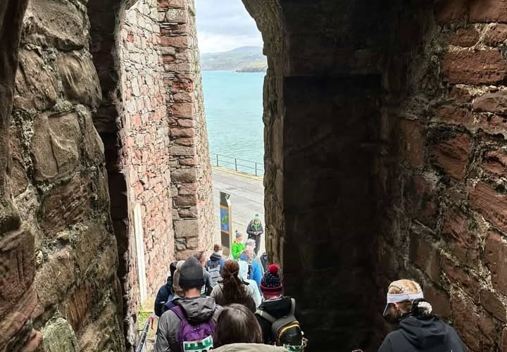 Walkers setting off from Peel Castle