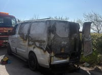 Firm 'devastated' after van catches fire outside hospital