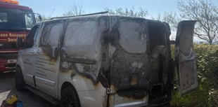 Firm 'devastated' after van catches fire outside hospital