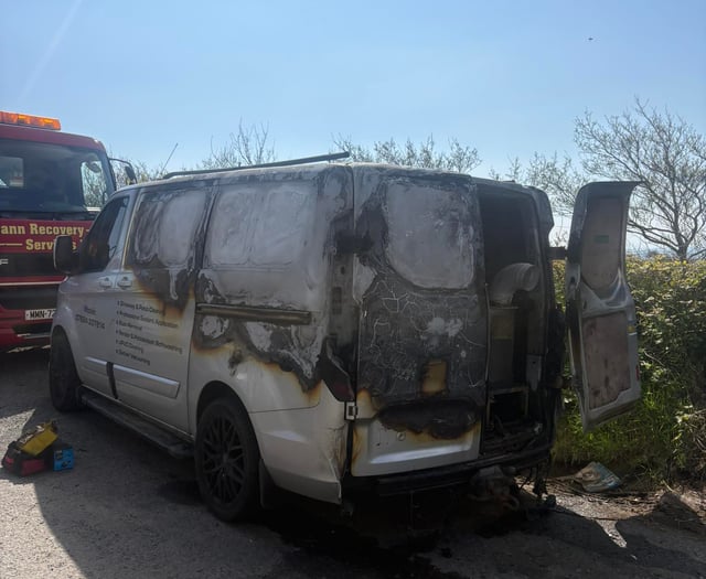 Firm 'devastated' after van catches fire outside hospital