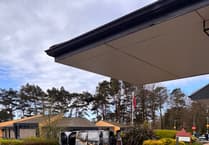 Hospital entrance hit by vehicle fire