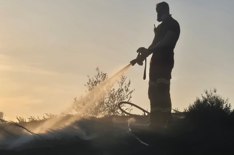 Firefighters tackle the wildfire at Hankley Common Credit: Liphook Fire Service