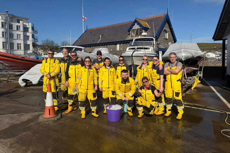 Participants in the charity car wash next to the Port St Mary RNLI station