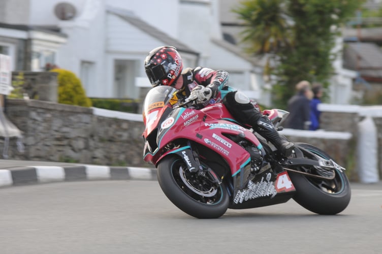 Conor Cummins competing at the 2011 Southern 100 aboard the McAdoo Kawasaki (Photo: John Watterson)