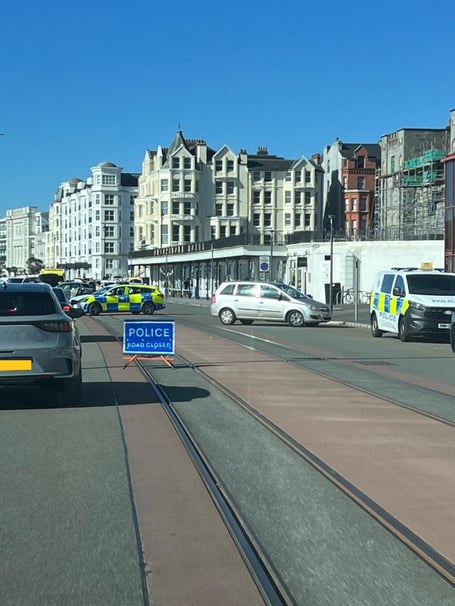 A police cordon is in place at the scene of the crash on Central Promenade, Douglas