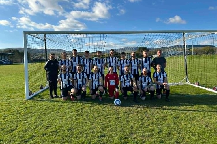 The Colby first team squad ahead of their title-clinching 1-0 win against Douglas Royals at Station Fields