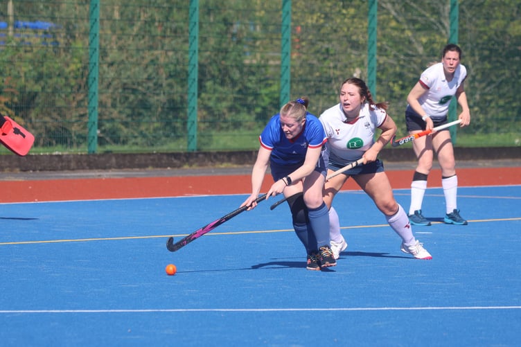 Action from Saturday morning's Women's Plate final between Valkyrs B (in blue) and Bacchas C (Photo: Paul Hatton)