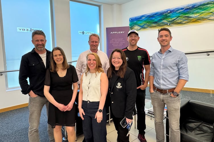 Appleby Isle of Man’s partners Tom Brook, Keira Gore, Mark Holligon, Claire Corkish, Claire Milne, Garry Manley with TT star Peter Hickman (second from right)