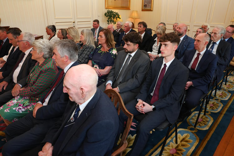 Friends, family and other Parish Captains watch on during the ceremony