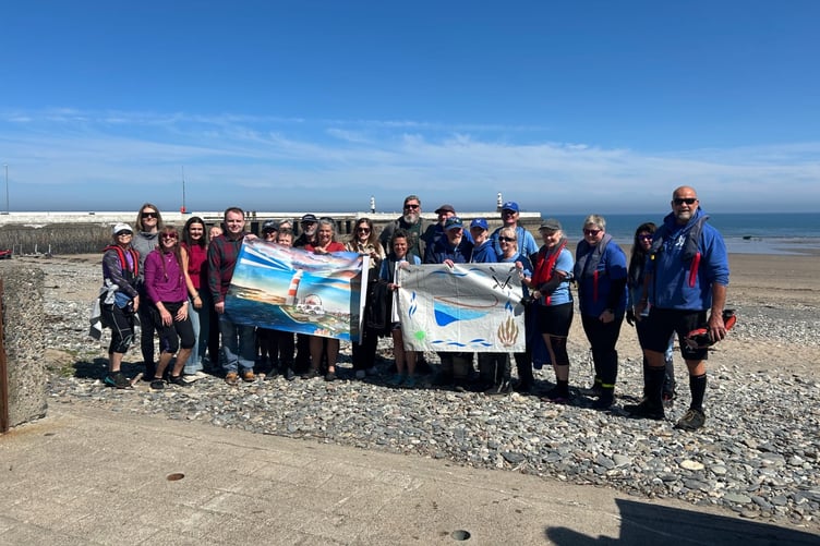 The flag exchange involving representatives from the Isle of Man and the Wigtown Bay Coastal Rowing Club