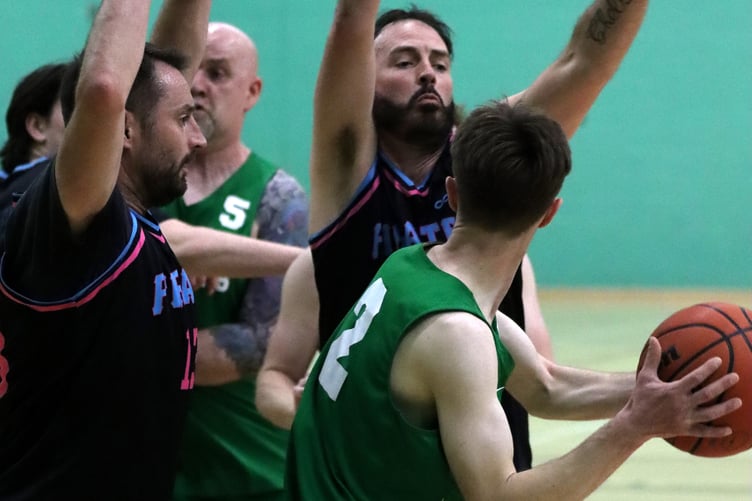 Pirates' duo Jamie Grose and Mike Brew double team Cavaliers' Andy Cregeen on the ball during the two sides' match-up at the NSC last week (Photo: Seb Smith)