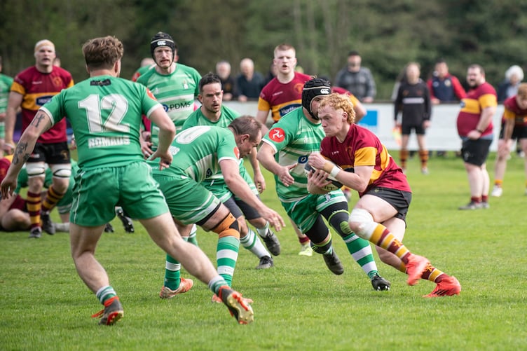 Douglas Celt’s Craig Martin searches for a way past the Southern Nomads defence at Port-e-Chee (Photo: Robin Hynes)