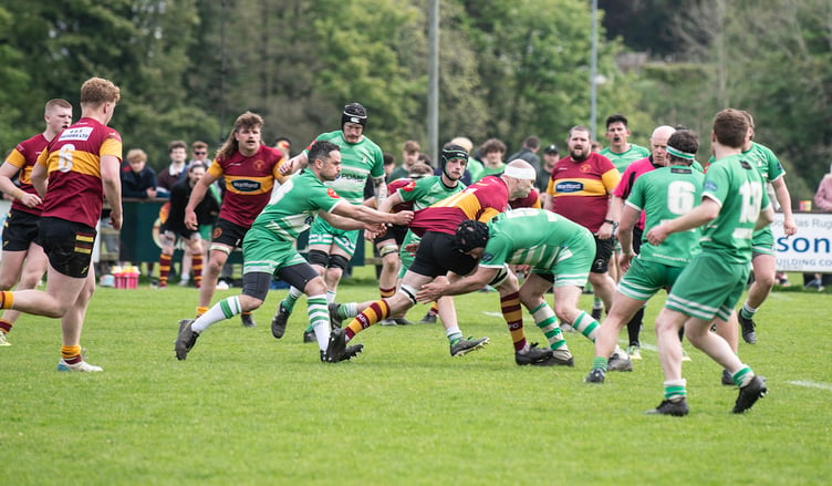 Douglas Celts' Craig McGee runs into the Southern Nomads defence during Saturday's Manx Cup final (Photo: Robin Hynes)