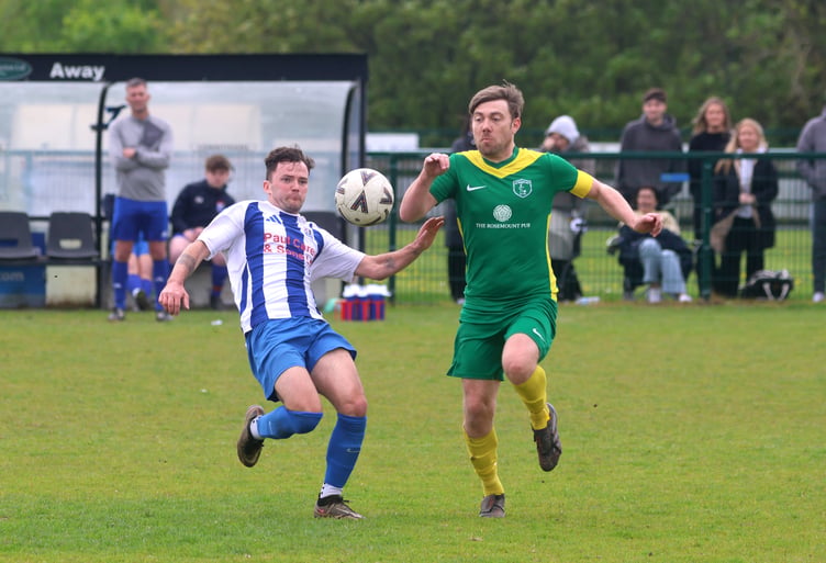 Ramsey's Rob Moreton (left) St Marys' Jamie Skillen compete for the ball during Sunday's Junior Cup quarter-final clash at Ballafletcher (Photo: Paul Hatton)