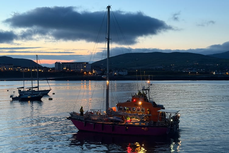 The stricken yacht after being towed into Port St Mary by the village's lifeboat on Sunday evening