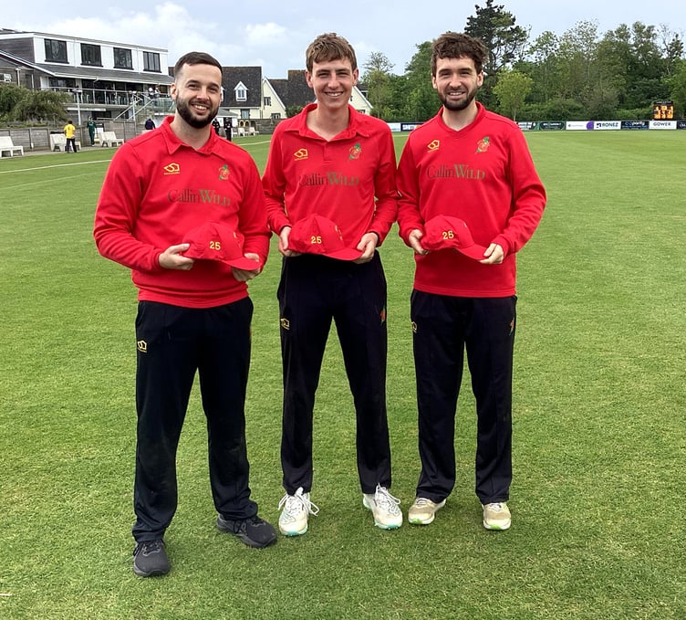 (Left to right) Matt Ansell, Carl Hartmann and Adam McAuley with their unique numbered red caps after reaching 25 appearances for the Isle of Man national side last weekend