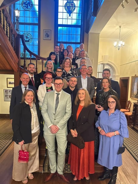 Will Bellamy with colleagues and friends celebrating at Government House