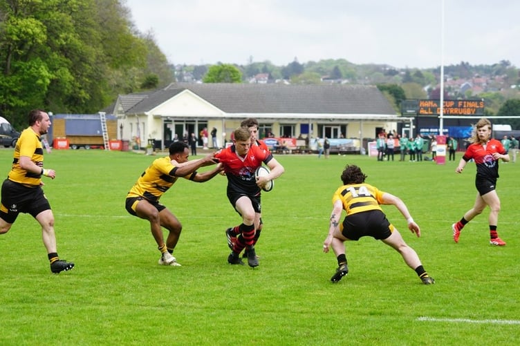 Ramsey's Brandon Atchison attempts to find a way through the Vagabonds' defence during Saturday's Manx Plate clash at Port-e-Chee (Photo: John Liver/Mumbles Pics)