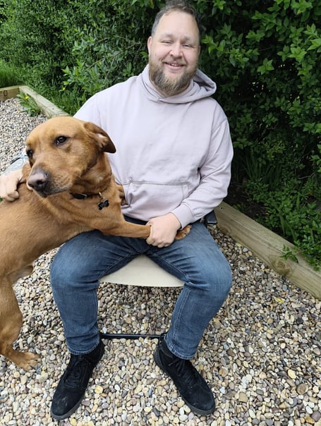 Granger Fox with his guide dog Evan