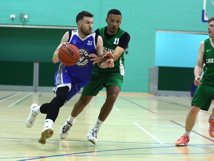 Viktor Capkanovski goes to the hoop for Wolves as Mike Lewis chases on defence for Cavaliers during their semi-final clash on Thursday evening (Photo: Martin Dunne)