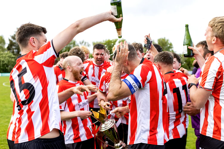 The Champagne flows as the Peel players celebrate their second Canada Life Premier League title in a row (Photo: Gary Weightman)