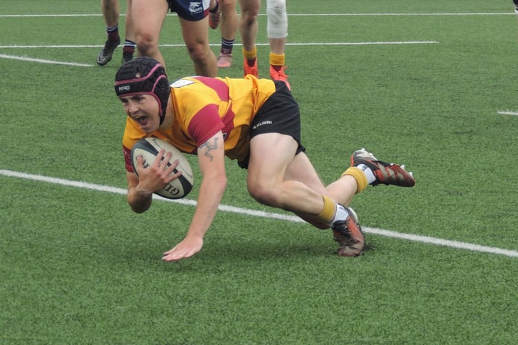 Nathan Robson dives over to open the scoring for Douglas against Wilmslow during the early stages of Saturday's final (Photo: Tony Wilson-Spratt)