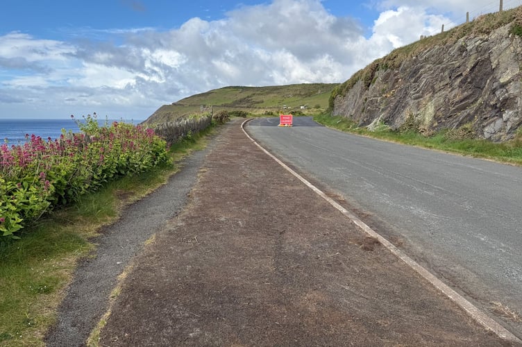 Part of the road has been relaid between Pigeon Stream car park and the gate at the northern end of the closed section (Photo: Manx.News)