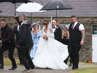 Watch the moment Tyson Fury walks daughter Venezuela into church