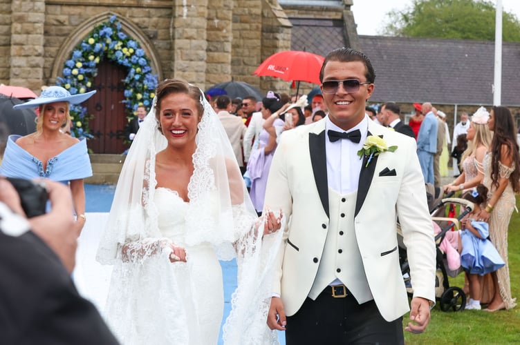 Venezuela Fury and Noah Price leaving the church at St John's after their marriage.