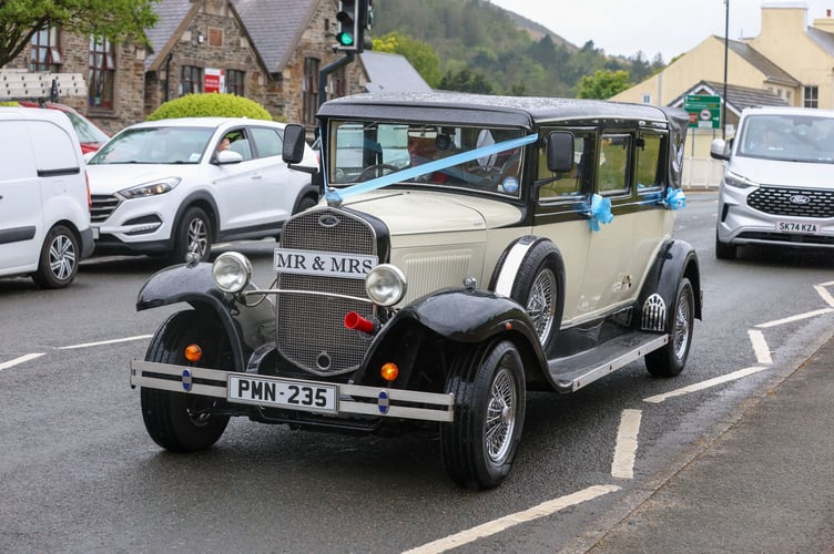 The vintage car Venezuela Fury and Noah Price arrived and left the wedding in.