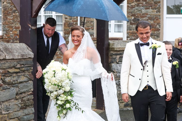 Venezuela Fury and Noah Price leaving their wedding at St John's in the Isle of Man.
