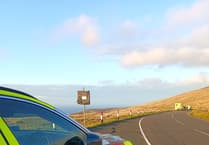 Vehicle overturns in crash on Mountain Road
