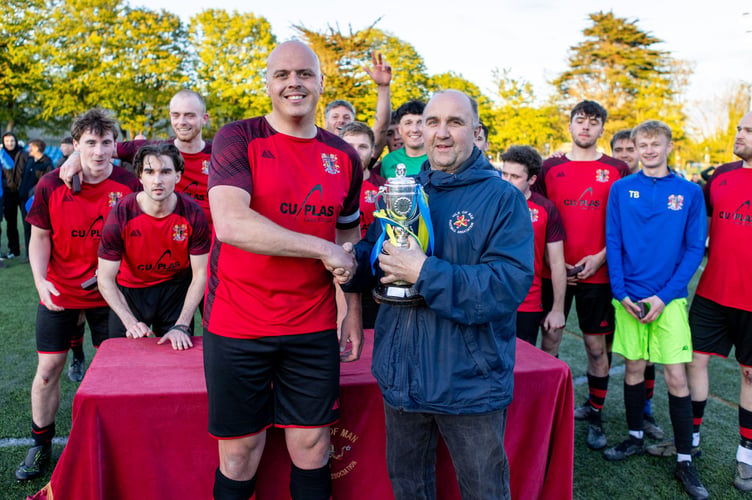 Isle of Man FA President and fixture guru Tony Mepham pictured with Ozzy Moore after their big win at The Bowl (Photo: Gary Weightman)