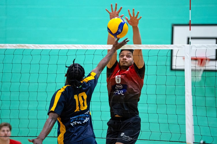 Jineth Dissanayake from the Isle of Man men's team blocks an effort from Anglesey's number 10 (Photo: Renze Dalugdog)