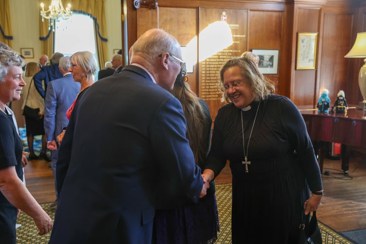 The Lieutenant Governor Sir John Lorimer welcomes Bishop Patricia Hillas