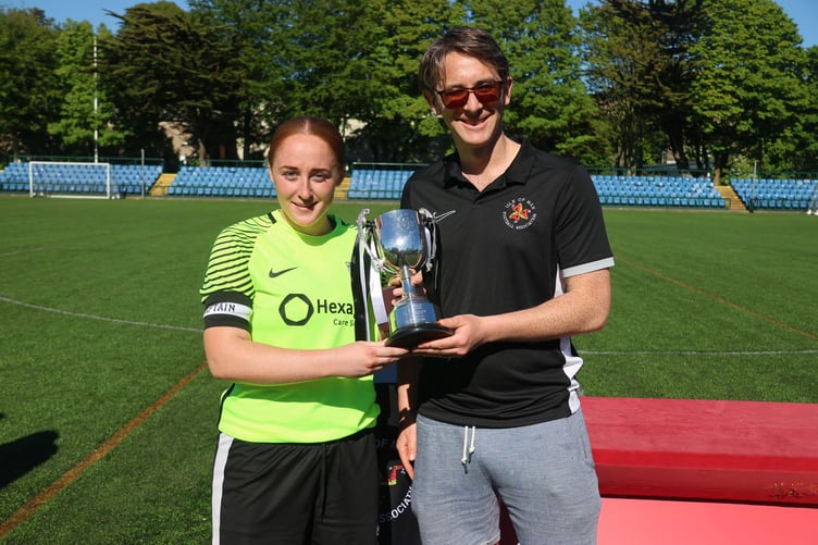 Corinthians' captain Lydia Shaw receives trophy from Canada Life's Tom Devine (Photo: Paul Hatton)