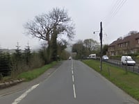 Occupant freed by fire crews from vehicle left on its side after crash