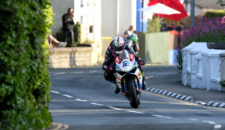 Ian Hutchinson heads through Kirk Michael on his Burrows Engineering Ducati on his way to posting the fourth fastest Supersport lap on Tuesday evening (Photo: Dave Kneale)
