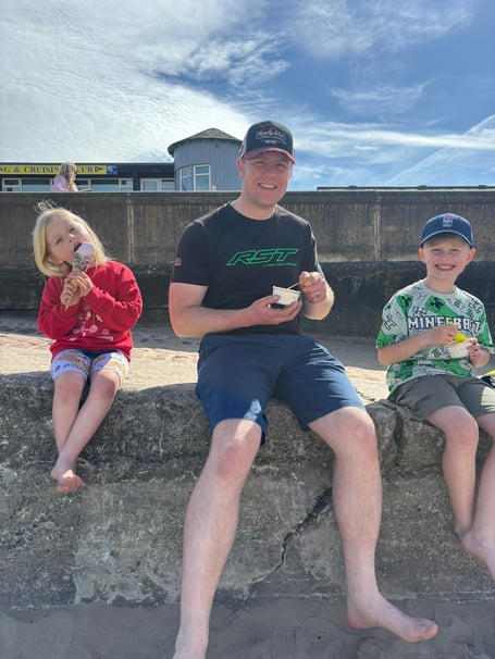 Daniel Ingham, who sadly lost his life in qualifying week at TT 2026, pictured with his young children Phoebe and Joey in Peel