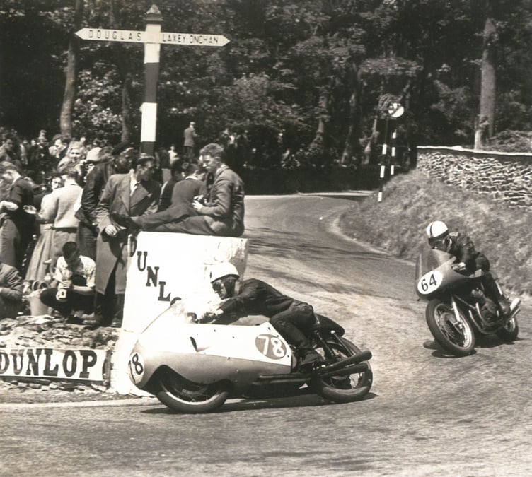 Bob McIntyre leads John Surtees round Governor's Bridge in the eight-lap Golden Jubilee Senior TT in 1957. They finished first and second in that order (Keystone Press/Alamy Stock Photo)