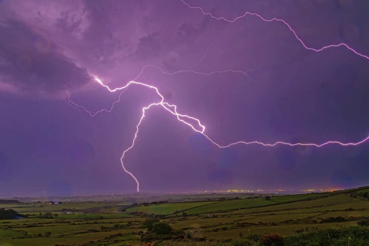 The lightning seen from Colby Glen Road towards Castletown (Photo: Digitalmanphotography / Ron Strathdee)