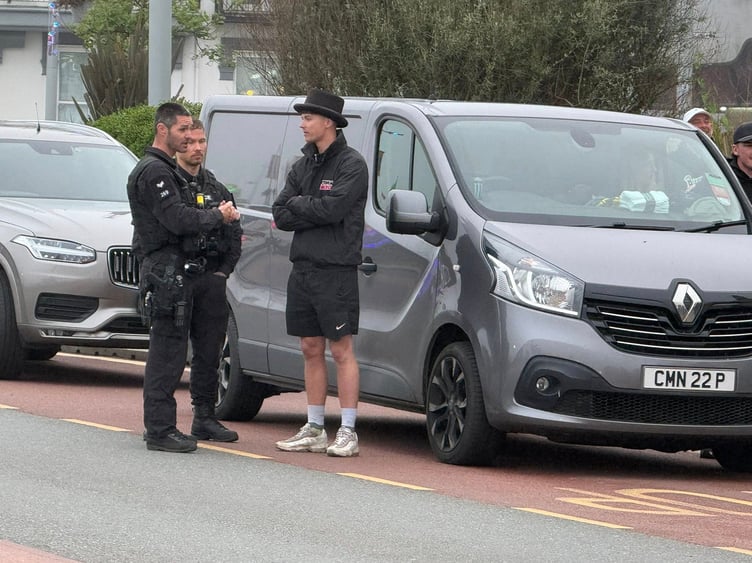 Police speaking to North West 200 winner Storm Stacey after his pick-up truck was seized on Harris Promenade last night (Monday). Photo: Baylon McCaughey